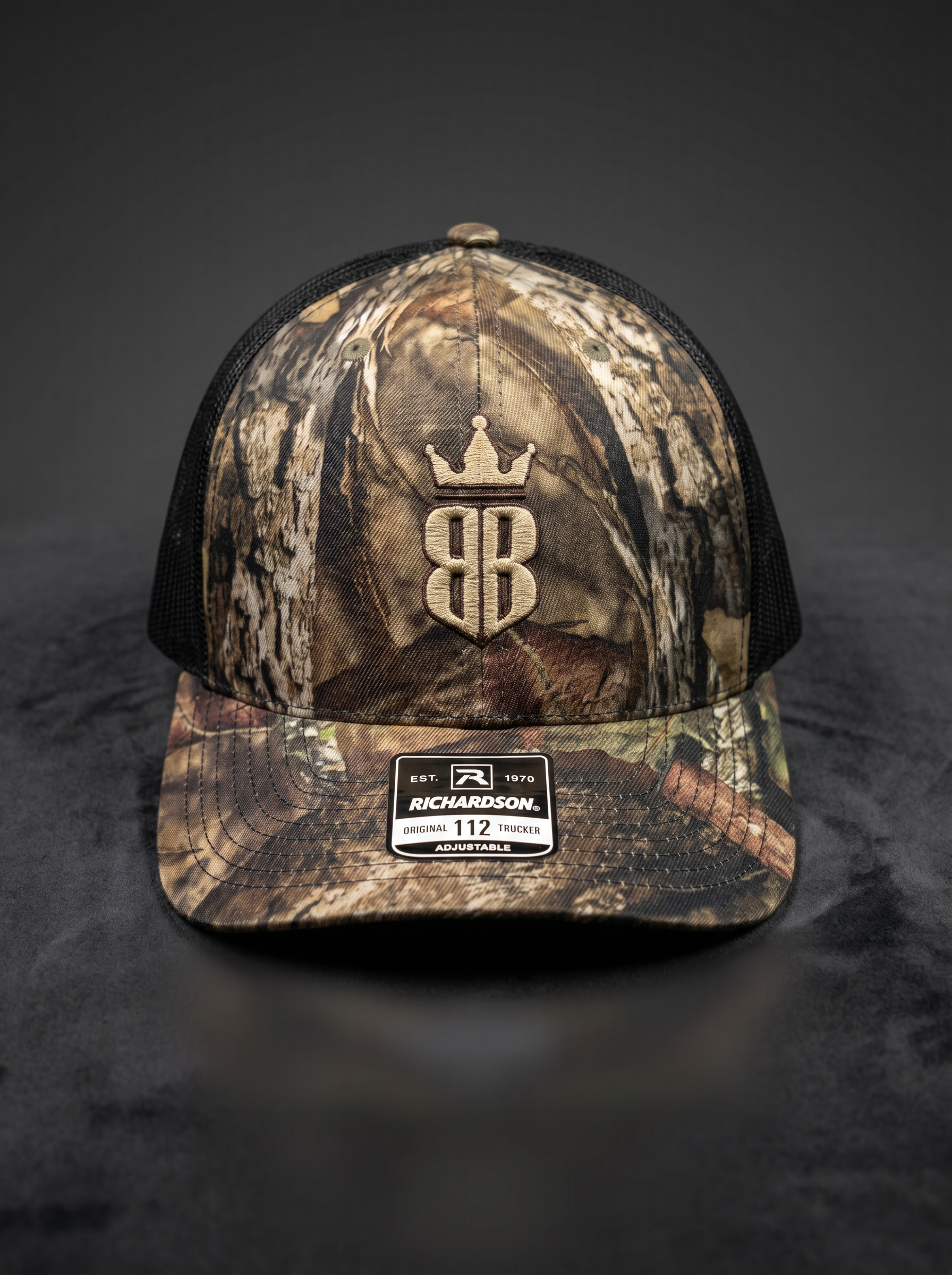 Camo Back Bar Richardson 112 trucker hat, front with embroidered BB crown logo
