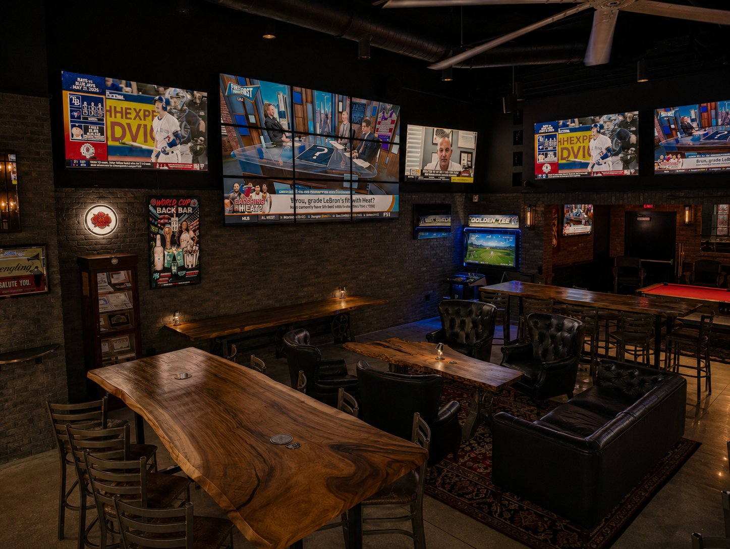 Lounge side at Back Bar with TVs, dart boards, pool table, and seating