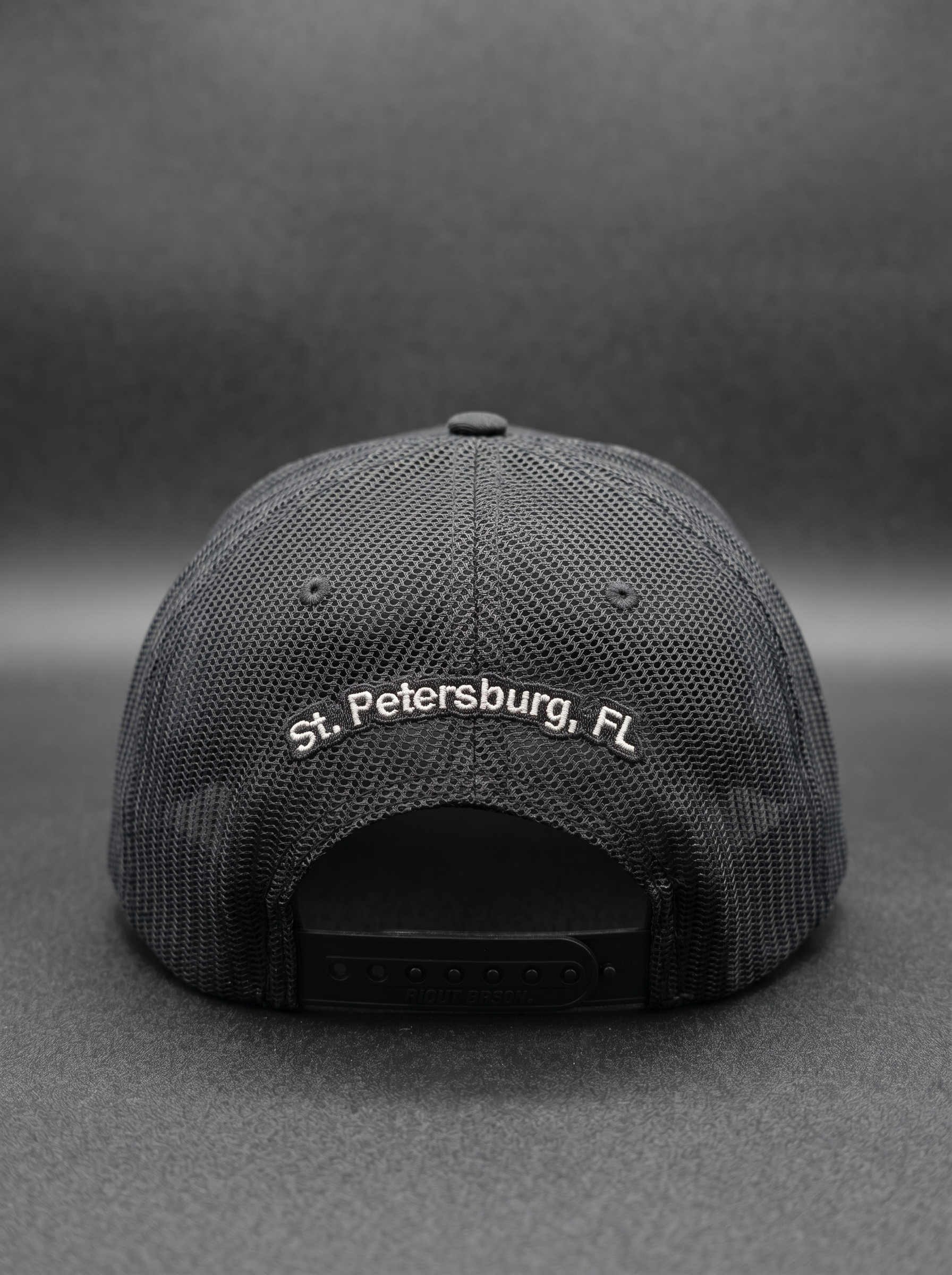 Back of the Back Bar trucker hat with 'St. Petersburg, FL' embroidery